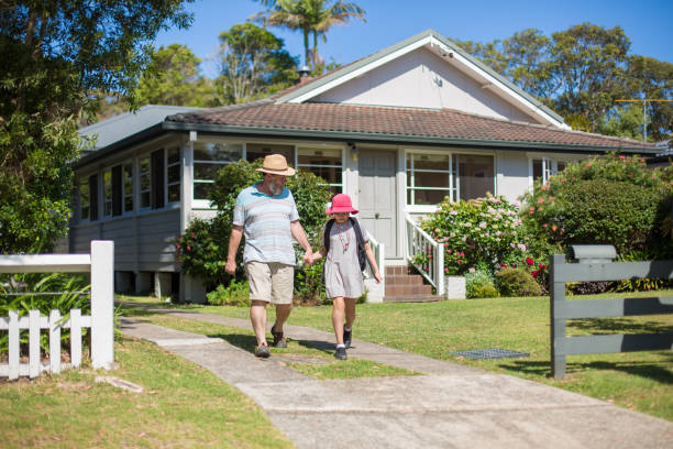 istock Grandfather taking granddaughter to school 985763346