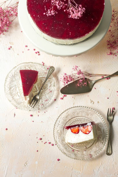 istock Coconut cheesecake with strawberries. Isolated. Flatlay. 985766618