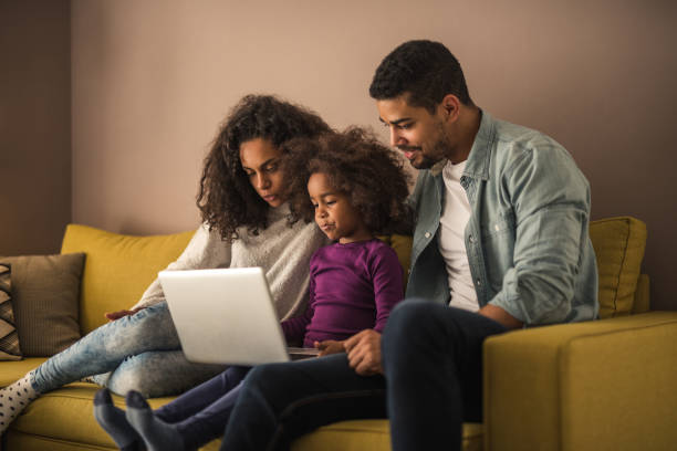 istock Watching cartoons together 985766646