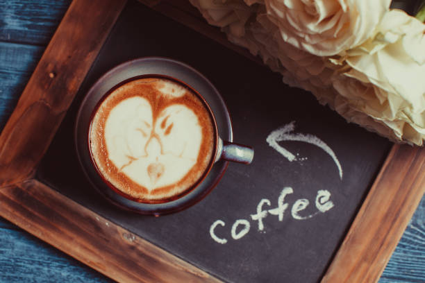 istock Latte art loving couple 985779648