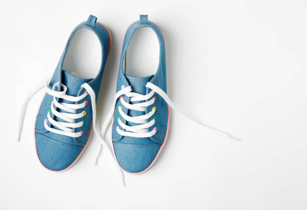 istock Pair sneakers shoes on white. 985784570