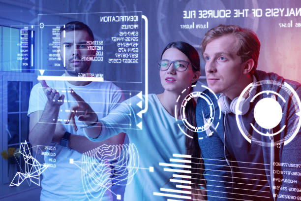 istock Thoughtful colleagues discussing a new program and looking at the screen 985790686