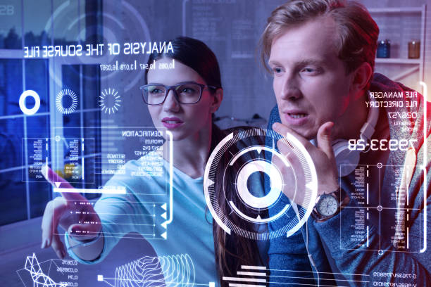 istock Worried colleagues looking at the screen while noticing strange information 985795644
