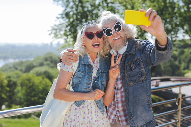 istock Joyful happy couple having fun 985800468