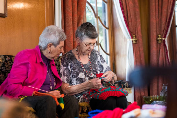 istock Chatting over knitting patterns social seniors enjoying time being creative 985801112