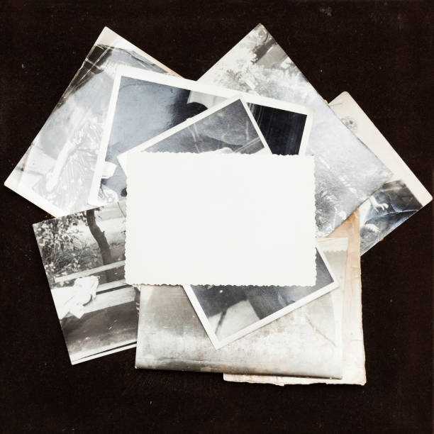 istock Old album photo, picture background, vintage frame stack. 985806270