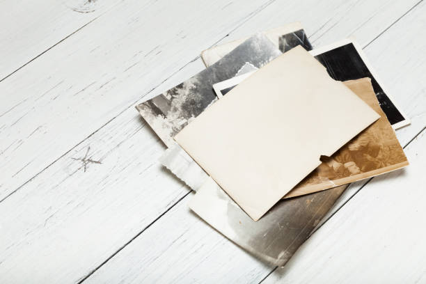 istock Old album photo, picture background, vintage frame stack. 985806286