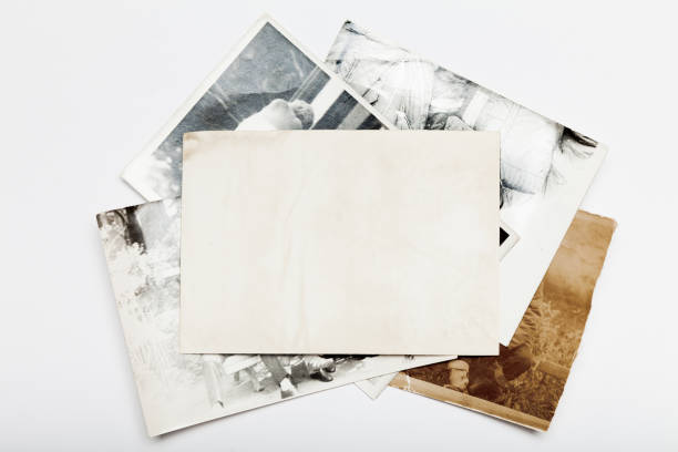 istock Old album photo, picture background, vintage frame stack. 985806462