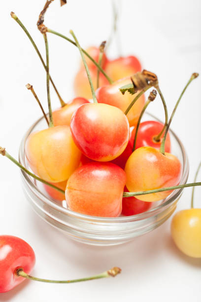 istock Rainier yellow cherry dessert, delicious bowl with berry 985806952