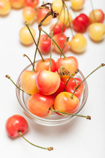 istock Rainier yellow cherry dessert, delicious bowl with berry 985806954