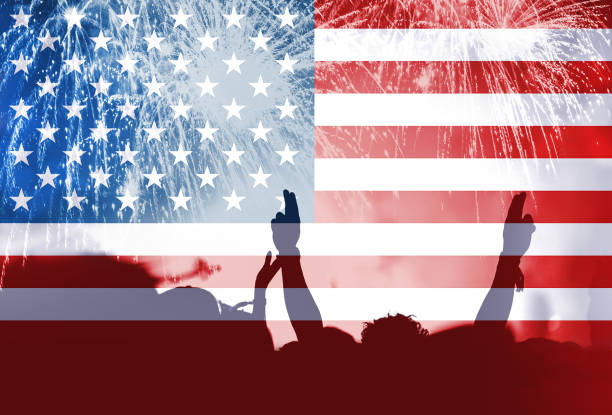 istock Independence day, fireworks, crowd and flag of America 985812496