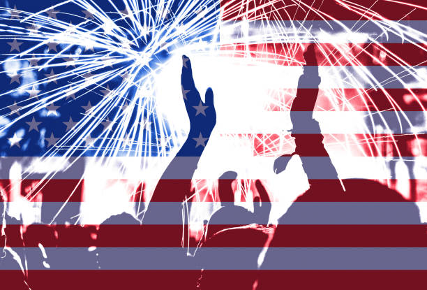 istock Independence day, fireworks, crowd and flag of America 985812524