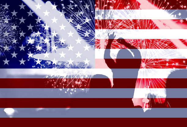 istock Independence day, fireworks, crowd and flag of America 985812532