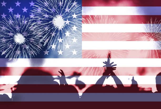 istock Independence day, fireworks, crowd and flag of America 985812548