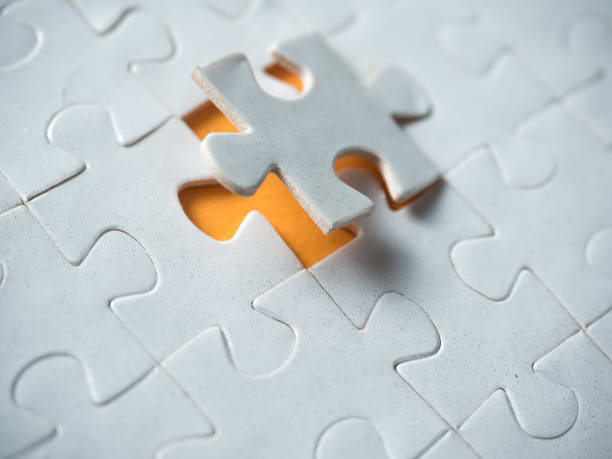 Jigsaw puzzle Jigsaw puzzle jigsaw piece photos stock pictures, royalty-free photos & images