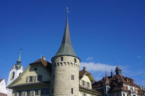 istock Stone made tower in town in Switzerland 985825920