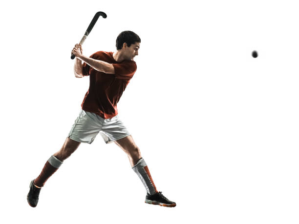 istock field hockey player man isolated silhouette white background 985826814