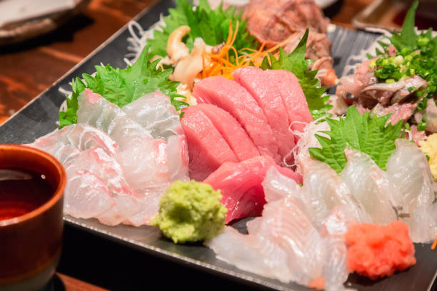 gemischte sashimi teller - sashimi stock-fotos und bilder