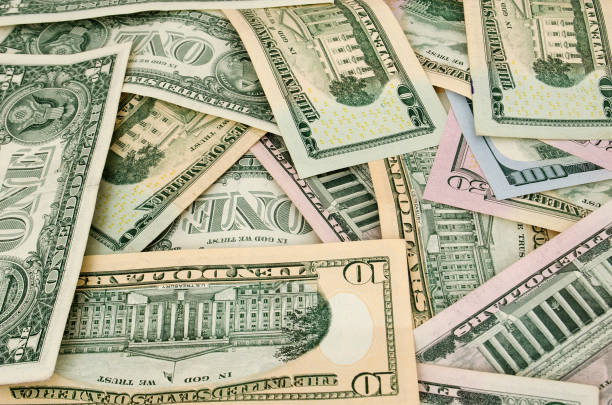 Amarican dollars are scattered with different memorials