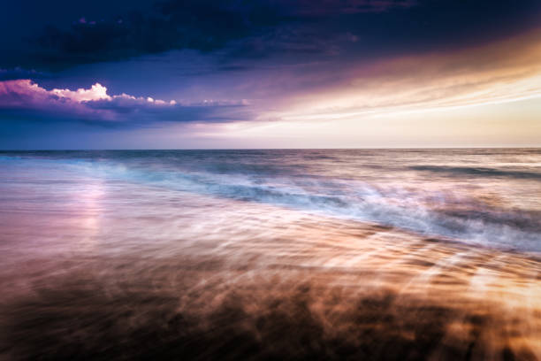 istock Waves at sunset at mediterranean sea 985843932