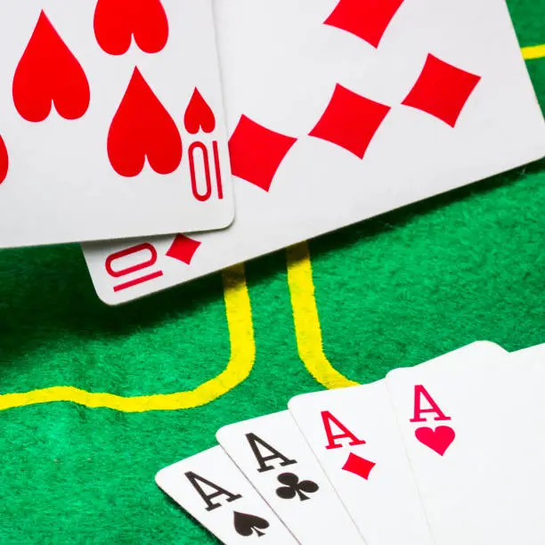 Photo of combination of four aces and falling playing cards
