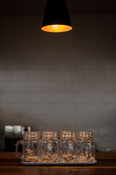 istock Vintage glasses on a bar at a restaurant 985848990