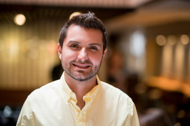 istock Happy business man at a co-working office 985849160