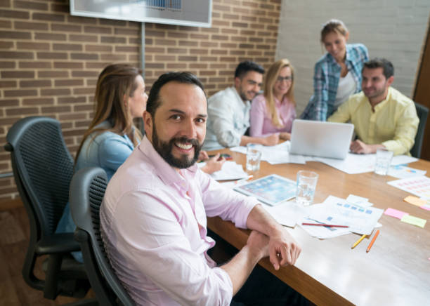 istock Business man in a meeting at a creative office 985849352