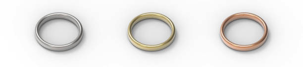 istock Silver, Gold, Copper rings isolated on white background. 3D rendering. 985857060