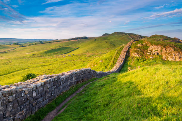 Roman Wall near Caw Gap Hadrian's Wall is a World Heritage Site in the beautiful Northumberland National Park. Popular with walkers along the Hadrian's Wall Path and Pennine Way pennines photos stock pictures, royalty-free photos & images