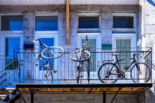 Three bicycles on a balcony in Montreal