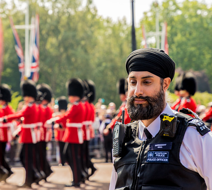 London, United Kingdom - May 29, 2023: Rear view of a horse guardsman in London.