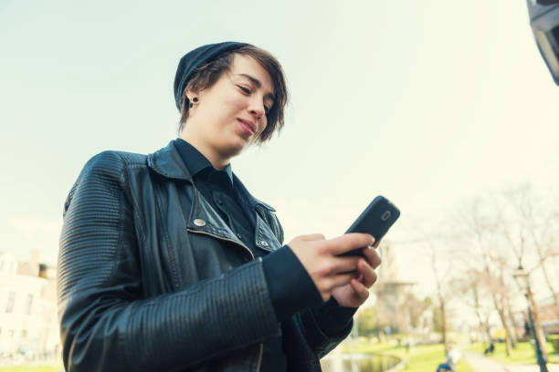 istock Young Dutch woman texting 985874108