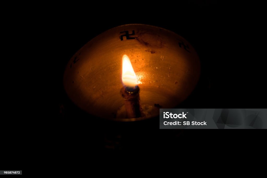 Flame Of Oil Lamp On Dark Background A Burning Oil Lamp In Darkness With Copy Space Concept Of Removing Darkness With A Flame Are Common In And Nepal For Festival Usage
