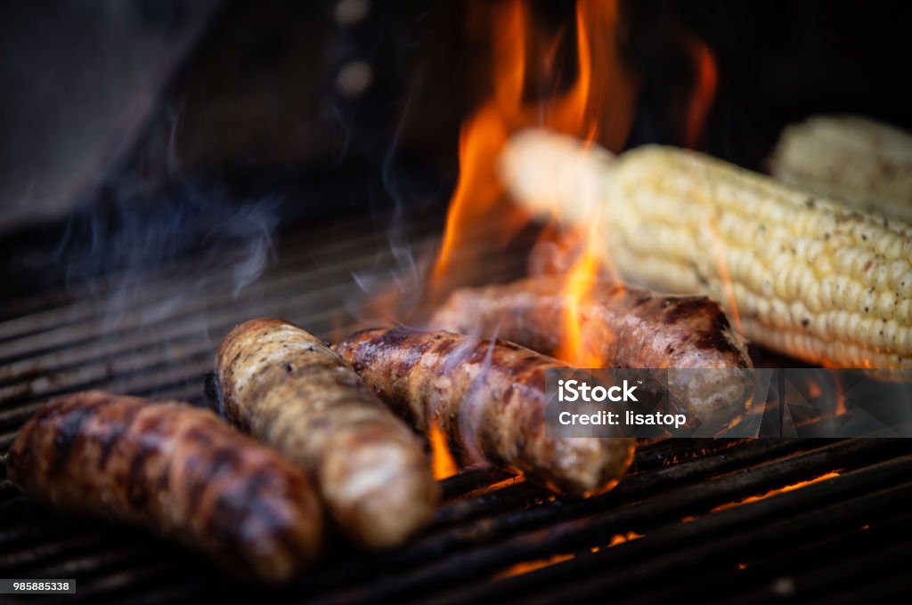 Grilling Sausage and Corn Barbecue - Meal Stock Photo