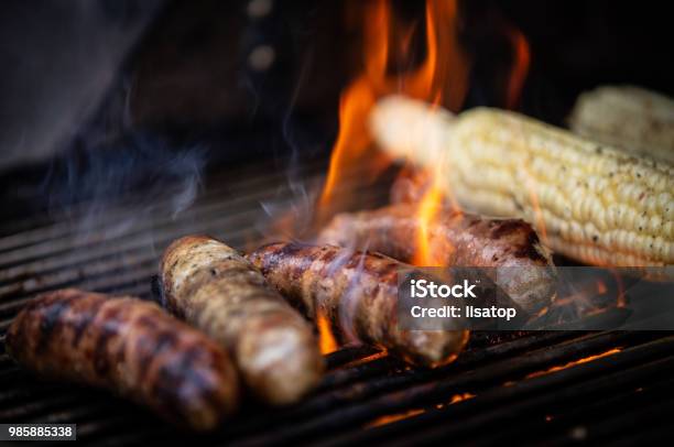 Grilling Sausage And Corn Stock Photo - Download Image Now - Barbecue - Meal, Barbecue Grill, Fire - Natural Phenomenon