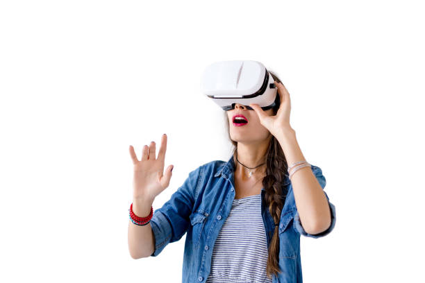 istock Woman with VR glasses studio shot 985887048