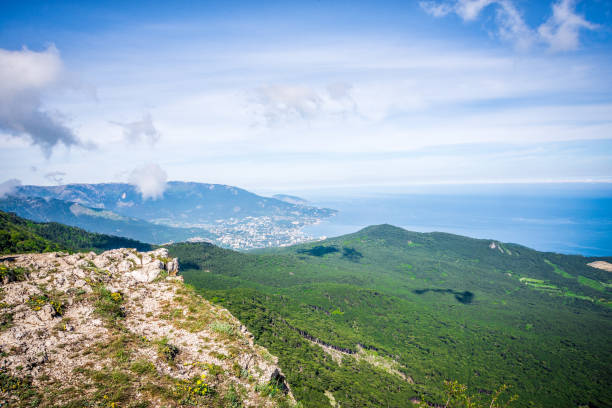 istock Mountain hill path road panoramic landscape over the sea 985896214