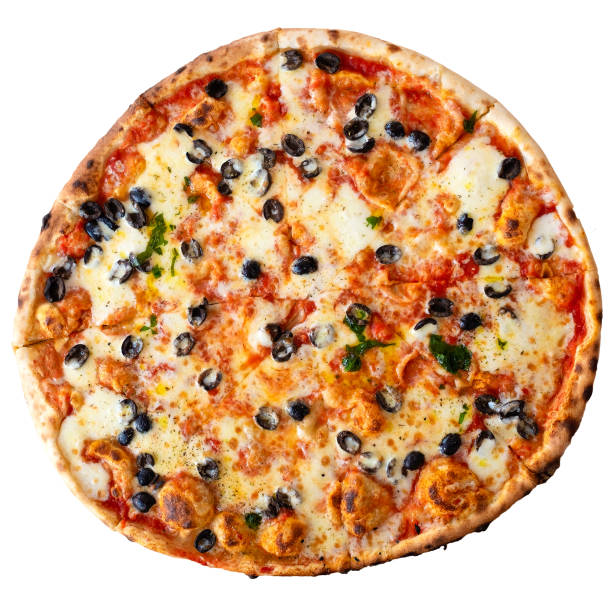 istock Large margherita pizza with black olives isolated on white from above. 985904210