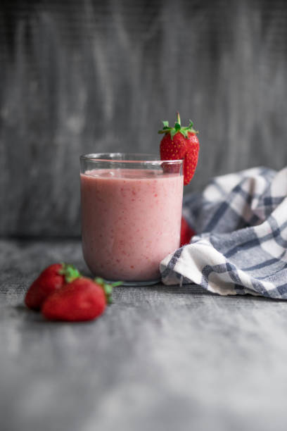 Still life of fresh strawberry smoothie