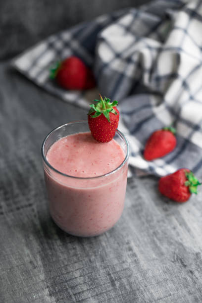 Still life of fresh strawberry smoothie
