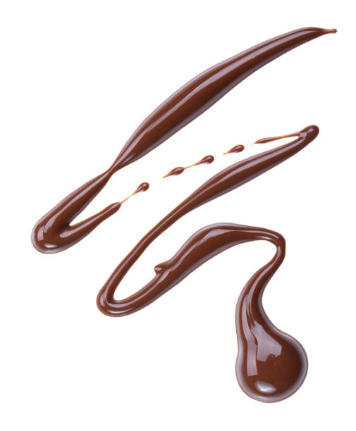istock Melting chocolate drips. Chocolate isolated on white background. 985909512