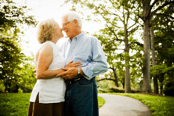 istock Senior couple holding hands 985909806