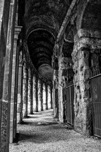 istock Roman ruins in Rome, Italy. Black and white. 985911334