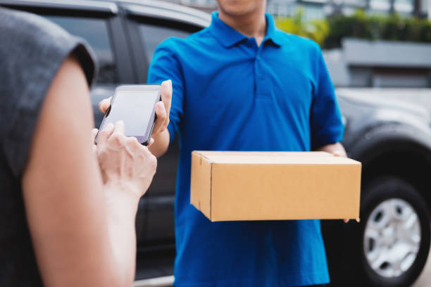 istock Customer service and delivery at home. 985915944