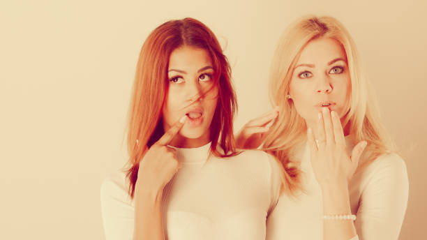 istock Two ladies in awkward moment. 985918776