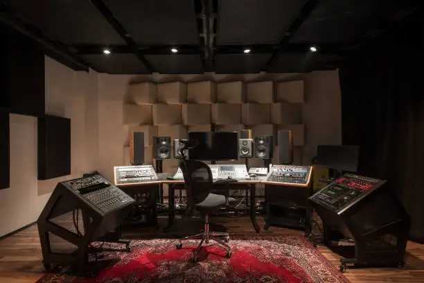 Photo of Front view of control desk in music studio room