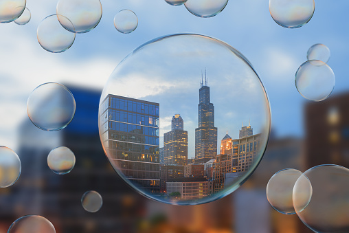 Chicago skyscrapers in downtown  in a huge soap bubble. Concept