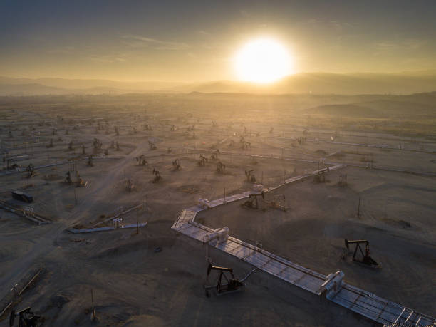 istock Setting Sun Over Oil Field - Drone Shot 985959518