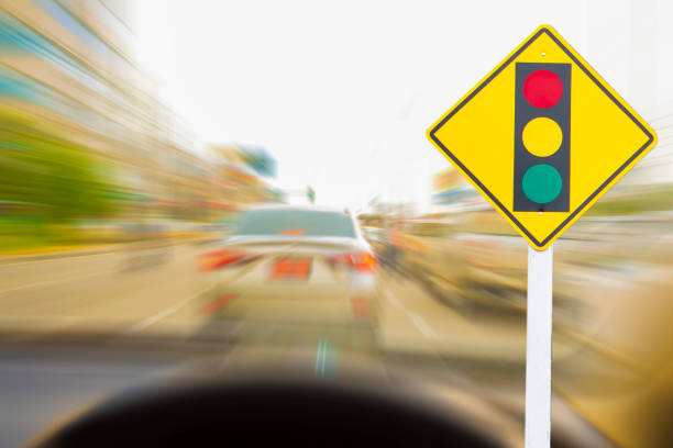 Traffic Signs Illegal speeding traffic in the capital blurred background With note on notepad.Metaphor Traffic to transport management for automobile or automotive car image.